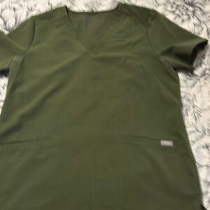 Used women’s figs uniform top
